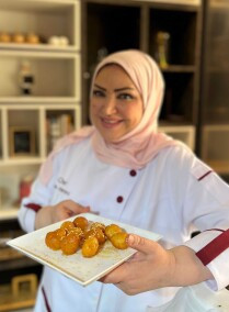 Experience Traditional Qatari Food with Chef Aisha Al Tamimi: Discover Margoog, Harees, Alba in a Cooking Class