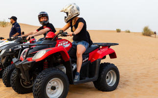 Sunset Desert Safari Trip by Quad Bike Group Tour